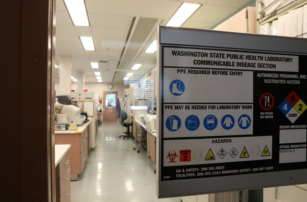 The state health laboratory in Shoreline recently added new sequencing equipment to increase surveillance for new variants of the novel coronavirus. (Ken Lambert / The Seattle Times)