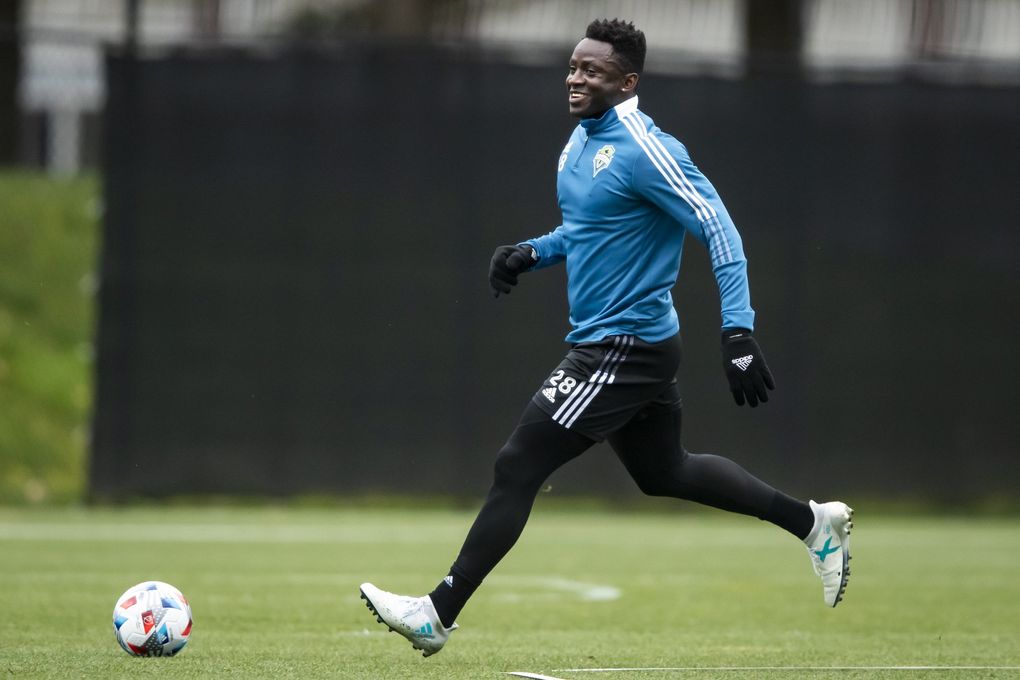 Defender Yeimar Gómez Andrade is all smiles as Seattle Sounders FC train at Starfire Sports in Tukwila Saturday March 20, 2021. (Bettina Hansen / The Seattle Times)