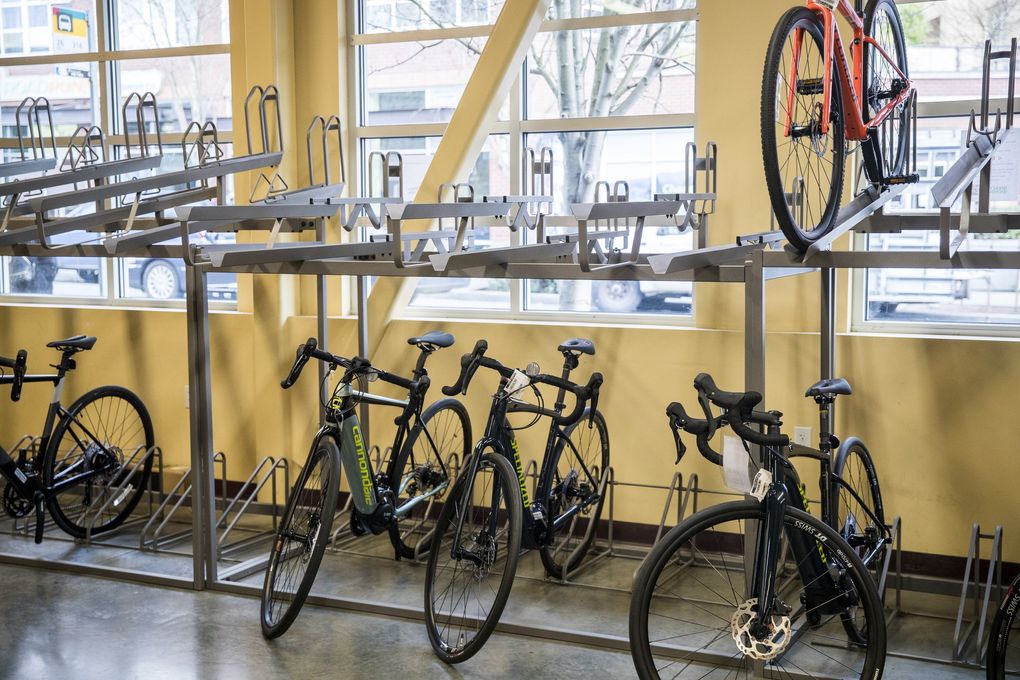 Marty Pluth, general manager of Gregg’s Cycles, says the showroom normally would be full of bikes. But due to high demand and limited supply he can’t fill the bike racks. Pluth says he has to order many of the bikes his costumers want instead selling one already in stock. (Amanda Snyder / The Seattle Times)