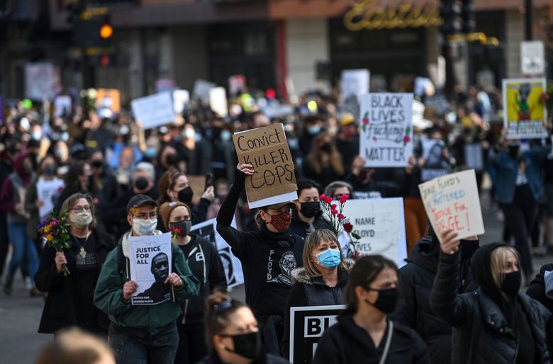 People protest near the Hennepin County Government Center in Minneapolis on Sunday, March 7, 2021. (Washington Post photo by Joshua Lott).