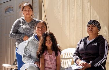 Maria Agnes Sanchez, center, and most of her family have contracted covid-19, the illness that can be caused by the novel coronavirus. (Photo for The Washington post by Allison Zaucha)