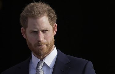 FILE – In this Thursday, Jan. 16, 2020,file photo, Britain’s Prince Harry arrives in the gardens of Buckingham Palace in London. Britainâ€™s Prince Harry has written the forward for a new book aimed at the children of frontline workers who died in the COVID-19 pandemic, sharing the pain he suffered as a boy after the death of his mother, Princess Diana. (AP Photo/Kirsty Wigglesworth, File) LBJ151 LBJ151
