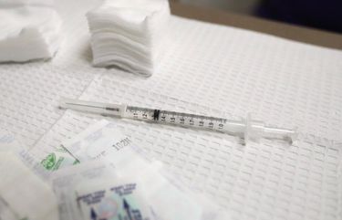 A first Pfizer COVID-19 vaccine awaits the arm of Melissa Nguyen, a contract administrator for the Seattle School District, Sunday, March 14, 2021 during a pop-up vaccination clinic occurring this weekend at the UW Medicine Neighborhood Shoreline Clinic, in collaboration with the Shoreline Fire Department. According to an email from Susan Gregg
Director, Media Relations
UW Medicine Marketing & Communications: “We vaccinated approximately 800 teachers, childcare workers and other eligible individuals. We received additional doses of the COVID-19 vaccine from an Eastern Washington facility who couldn’t readily use them. Airlift Northwest, entity of UW Medicine, transferred the doses here.” 216643