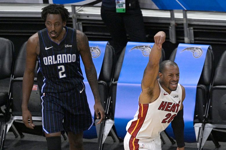 Andre Iguodala of the Miami Heat passes the ball against Gordon