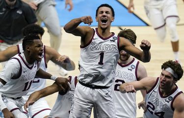 Gonzaga guard Jalen Suggs (1) celebrates making the game winning basket against UCLA during overtime in a men’s Final Four NCAA college basketball tournament semifinal game, Saturday, April 3, 2021, at Lucas Oil Stadium in Indianapolis. Gonzaga won 93-90. (AP Photo/Michael Conroy) INCN398 INCN398