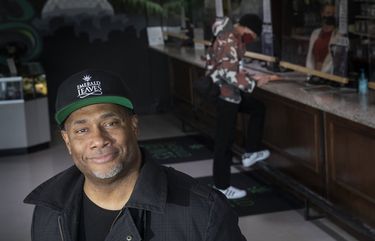 Duane Dunn, owner of Emerald Leaves in Tacoma, hangs out in his Tacoma store in  March. A bill to expand the marijuana social equity program is in the Legislature. The bill aims to get more cannabis business licenses in the hands of people from communities disproportionately impacted by the war on drugs. Dunn says the licensing system favors people already wealthy and connected and the social equity program could level the barriers to getting a license. He got his retail license after marijuana was legalized in the state  and opened his store in 2015. (Ellen M. Banner / The Seattle Times)
