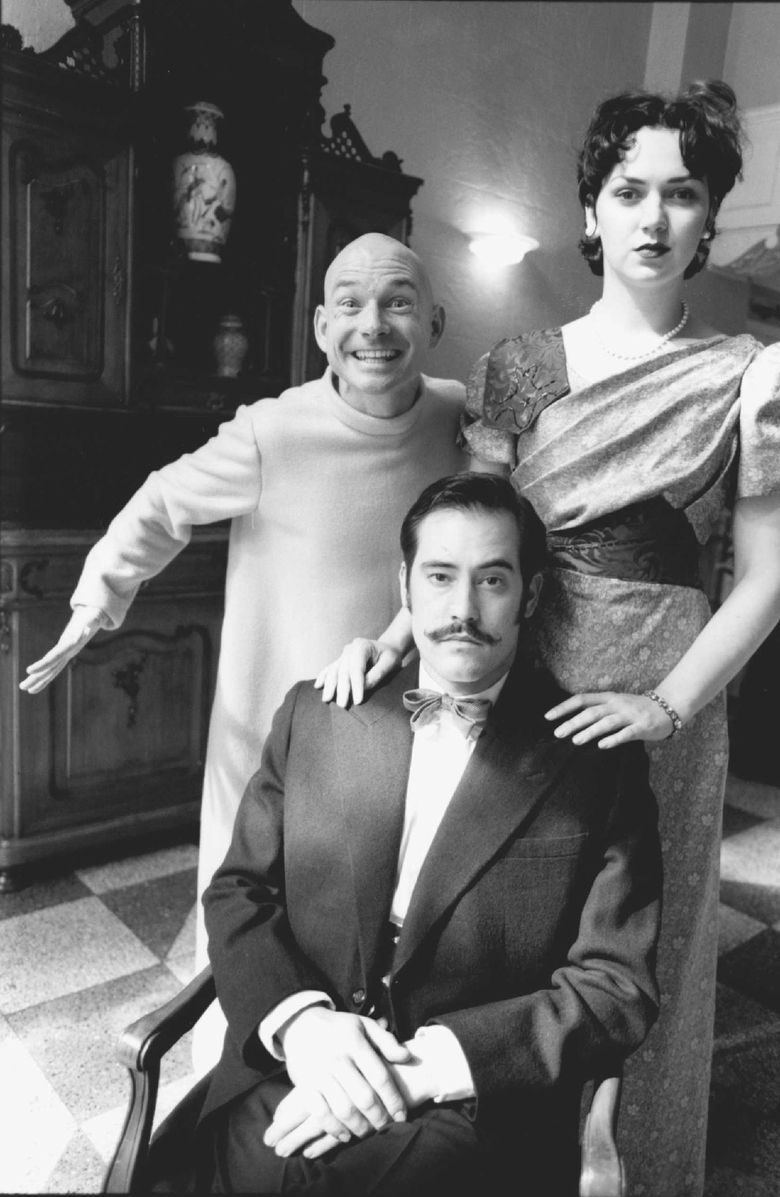 In 1995, Seanjohn Walsh, left, starred as the mischievous cartoon character of the title in Annex Theatre’s “The Yellow Kid.” The musical, based on the 1895 newspaper cartoon that spawned the term “yellow journalism,” also featured Adrian LaTourelle (seated) and Elizabeth Gordon. (Debra LaCoppola / Courtesy Annex Theatre)