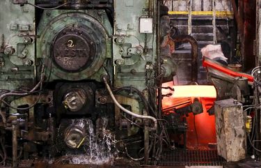 Steel passes through finishing stands in the hot-strip mill at the U.S. Steel Granite City Works facility Thursday, June 28, 2018, in Granite City, Ill. (AP Photo/Jeff Roberson) ILJR
