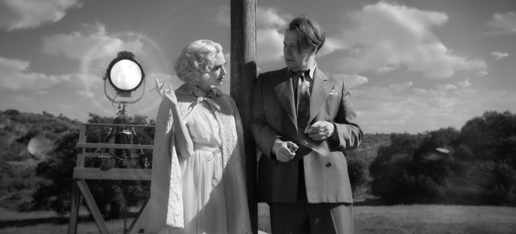 Amanda Seyfried as Marion Davies and Gary Oldman as Herman Mankiewicz in “Mank,” directed by David Fincher. (Netflix)