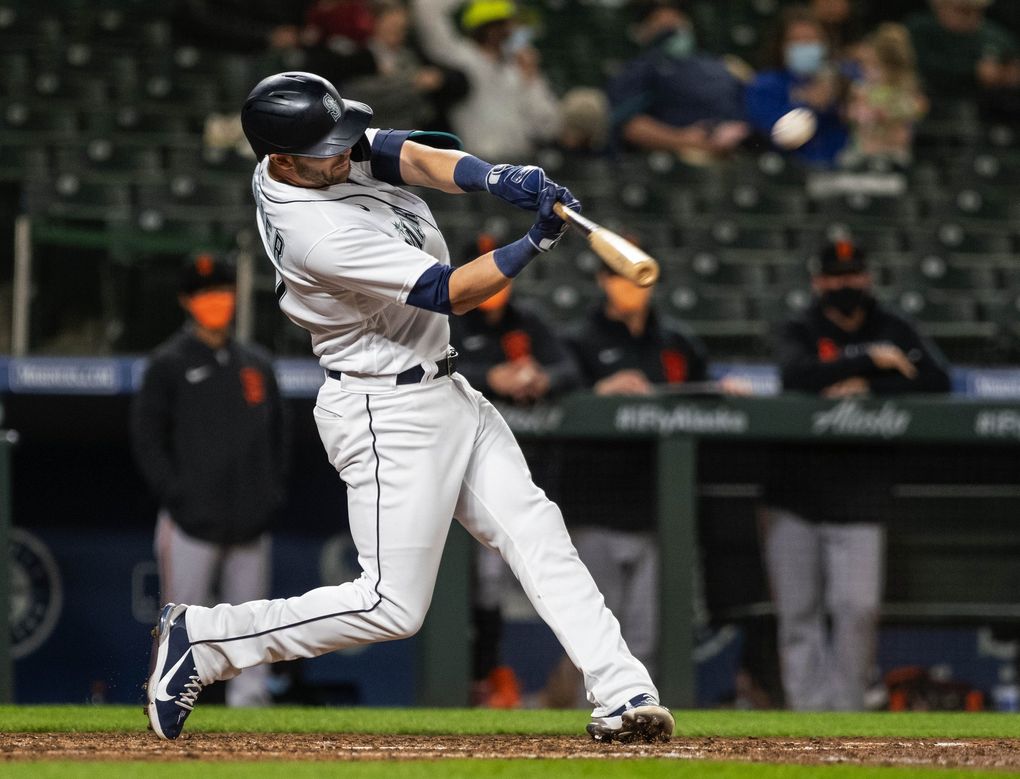 Mitch Haniger sends a solo home run to left field against the Giants earlier this month at T-Mobile Park. (Dean Rutz / The Seattle Times)
