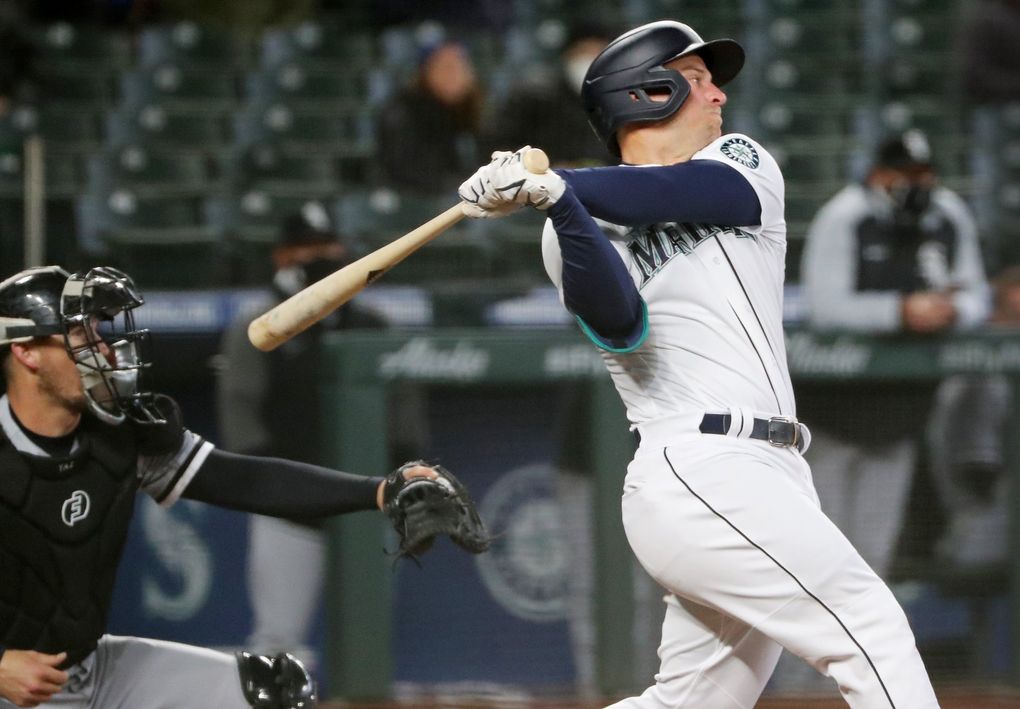 Mariners third baseman Kyle Seager hits a three-run double to put the Mariners back in the lead in the sixth inning against the White Sox on April 7. (Ken Lambert / The Seattle Times)