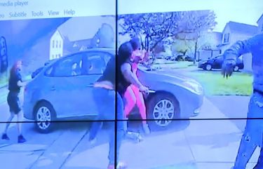 In an image from police bodycam video that the Columbus Police Department played during a news conference Tuesday night, April 20, 2021, a teenage girl, foreground, appears to wield a knife during an altercation before being shot by a police officer Tuesday, April 20, 2021, in Columbus, Ohio. Police shot and the girl just as the verdict was being announced in the trial for the killing of George Floyd. State law allows police to use deadly force to protect themselves or others, and investigators will determine whether this shooting was such an instance, Interim Police Chief Michael Woods said at the news conference. (Columbus Police Department via WSYX-TV via AP) PAKS202 PAKS202