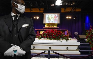 The casket of Daunte Wright rests in place before funeral services at Shiloh Temple International Ministries in Minneapolis, Thursday, April 22, 2021. Wright, 20, was fatally shot by a police officer during a traffic stop. (AP Photo/John Minchillo, Pool) MNMC104 MNMC104