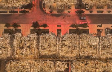 TALENT, OR – SEPTEMBER 12: Remnants of red fire retardent was still visible days after hundreds of homes were destroyed by urban wildfire in Talent, OR. and other nearby towns. This aerial image made from a drone was shot September 12, 2020. (Photo by David Ryder/Getty Images) 775560873