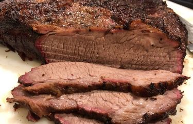 It took eight hours or so to make, but beef brisket cooked in a kamado grill turned out just the way they make it in Texas. (Daniel Neman/St. Louis Post-Dispatch/TNS) 14138883W 14138883W
