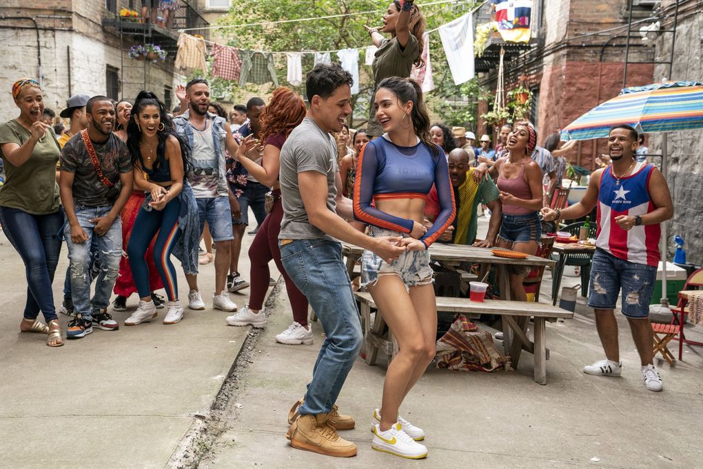 Anthony Ramos as Usnavi and Melissa Barrera as Vanessa in Warner Bros. Pictures’ “In the Heights.” (Macall Polay / Warner Bros. Entertainment)