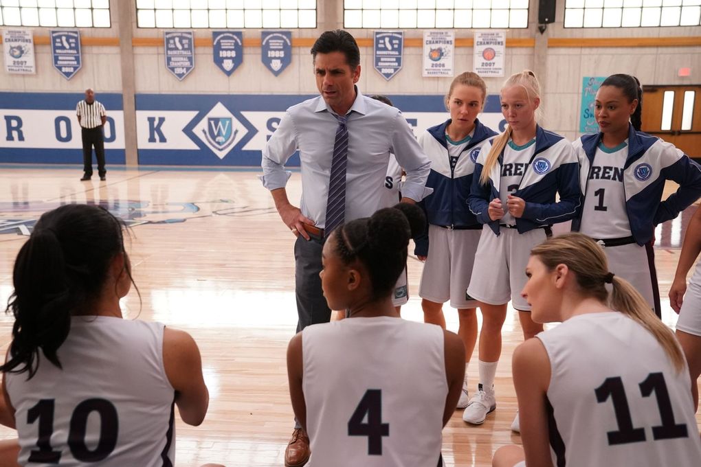 John Stamos plays a basketball coach at an all-girls private high school in “Big Shot” on Disney+. (Disney)