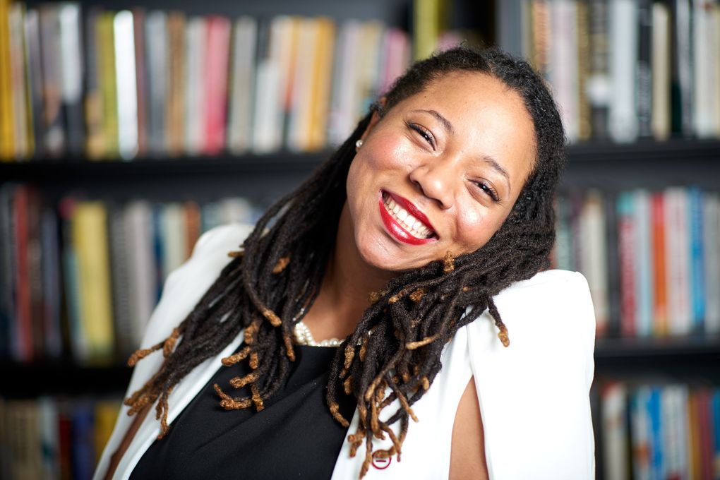 L. Patrice Bell, director of guest services and external affairs at Northwest African American Museum, in NAAM’s reading room. (Michael B. Maine)