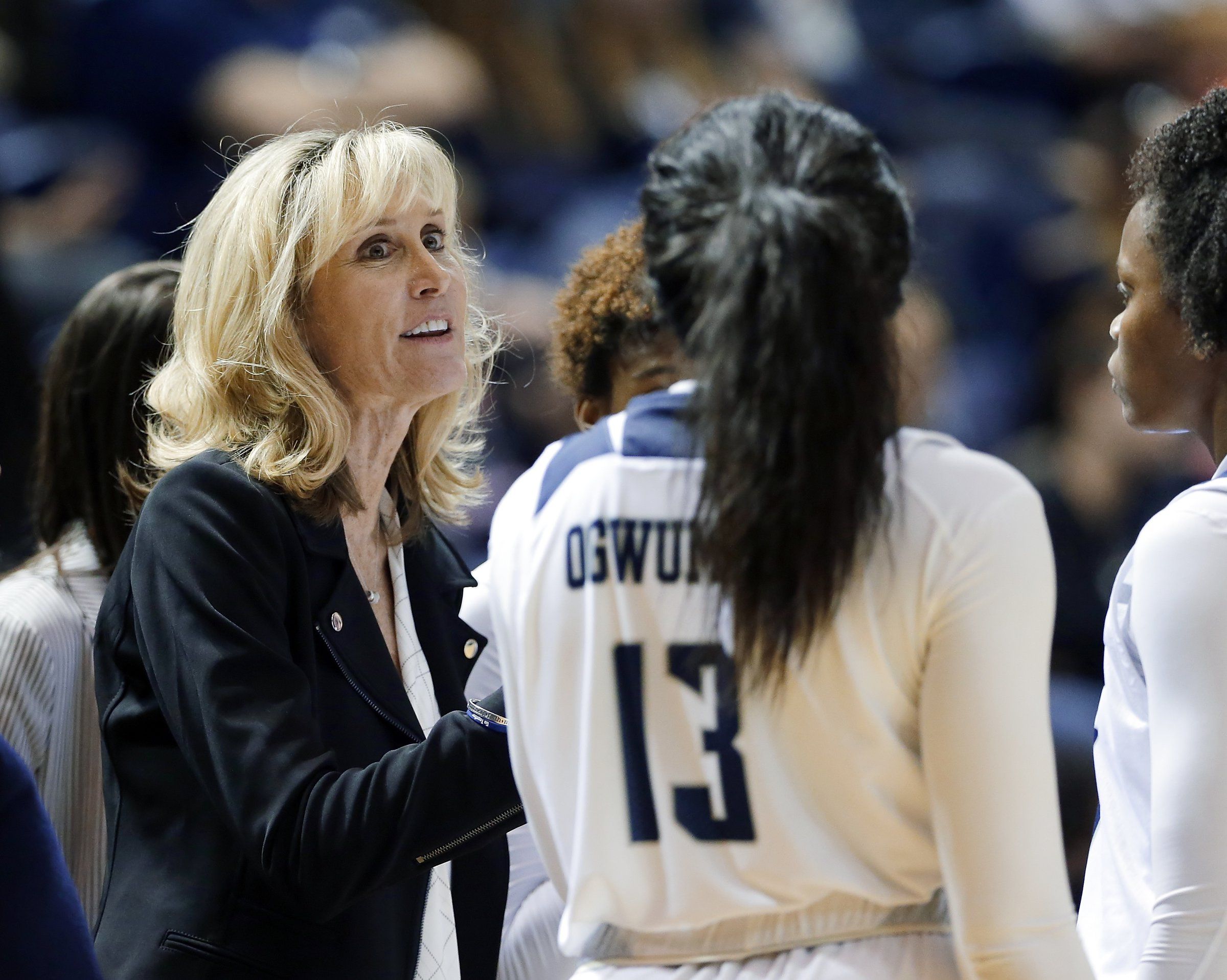 All You Need to Know About UW Women's Basketball Coach