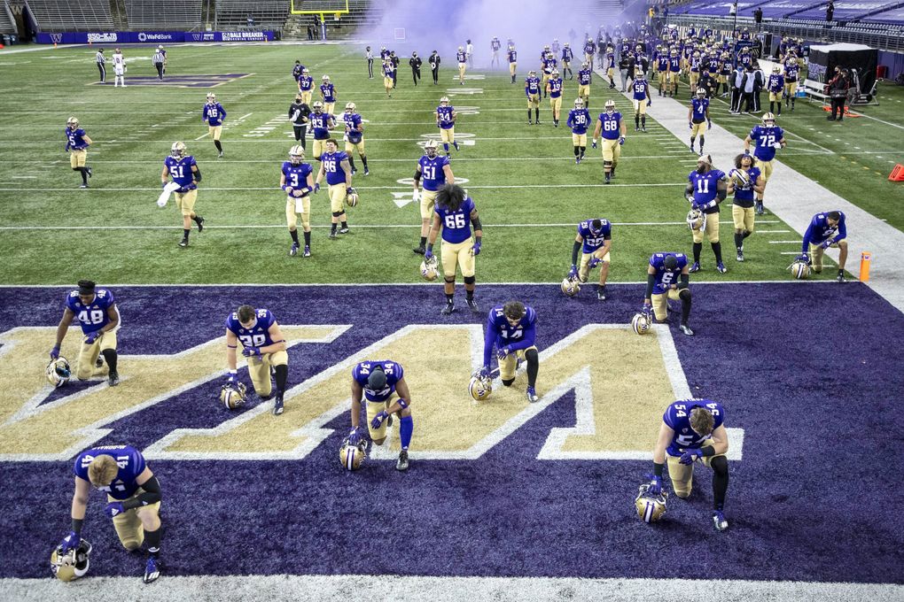 Washington comes out ffor its game with Utah Saturday. The University of Utah played the Washington Huskies in Pac-12 Football November 28, 2020 at Husky Stadium. (Dean Rutz / The Seattle Times)