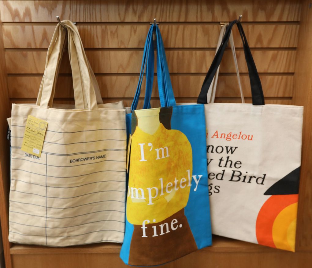 Canvas tote bags are for sale at Brick & Mortar Books, a family-owned indie bookseller in Redmond that has served the local community for nearly four years. (Ken Lambert / The Seattle Times)