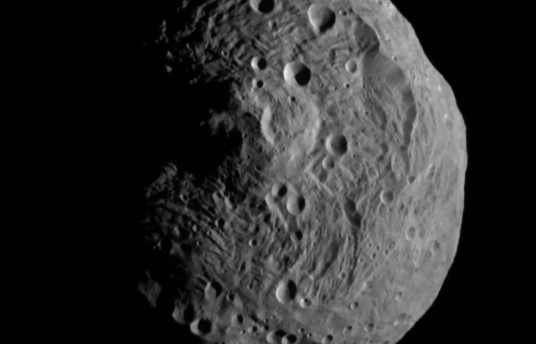 In an undated image provided by NASA/JPL-Caltech/UCLA/MPS/DLR/IDA; Little Mountain 5, the asteroid Vesta, as seen from the Dawn spacecraft in 2011. Astronomers reconstructed a space rock’s path before it exploded over southern Africa in 2018 and sprinkled the Kalahari with meteorites. (NASA/JPL-Caltech/UCLA/MPS/DLR/IDA; Little Mountain 5 via The New York Times) — FOR EDITORIAL USE ONLY. —