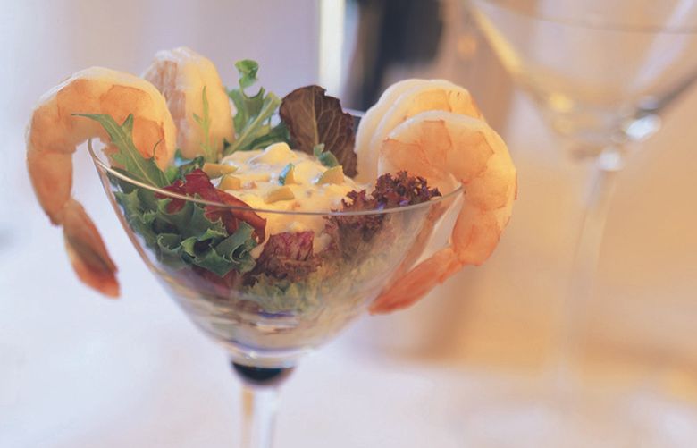Shrimp & grits side dish appetizer in fancy martini cocktail glasses -  steaming hot southern comfort Stock Photo by wirestock