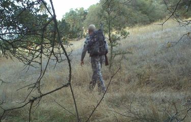FOR TZR ONLY An image from the trail camera used in the Department of Fish and Wildlife investigation of Chris Stone’s hunting activities allegedly shows him in the area were investigators had previously found illegal bait. (CALIFORNIA DEPARTMENT OF FISH AND WILDLIFE)