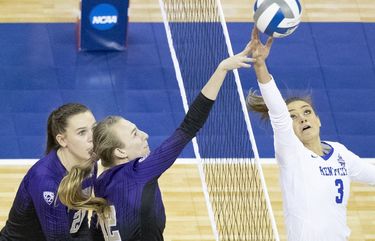 Washington’s Claire Hoffman (21), from left, and Marin Grote (12) reach to block a tip from Kentucky’s Madison Lilley (3) in the first set of the semifinal of the 2020 NCAA D1 Volleyball Championship at CHI Health Center in Omaha, Nebraska, Thursday, April 22, 2021.
By Rebecca S. Gratz
