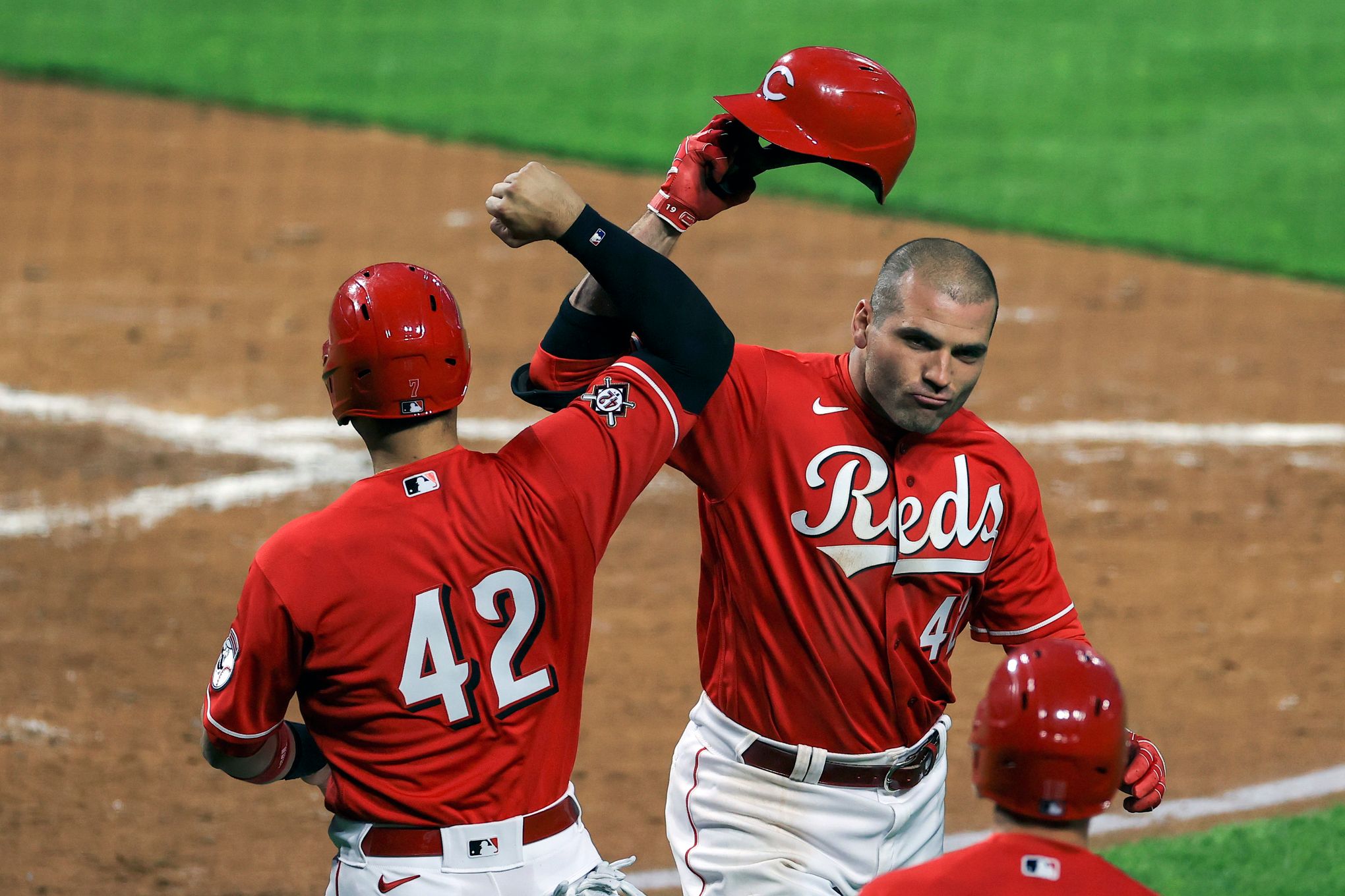 Why Joey Votto wore a high school football jersey in press conference