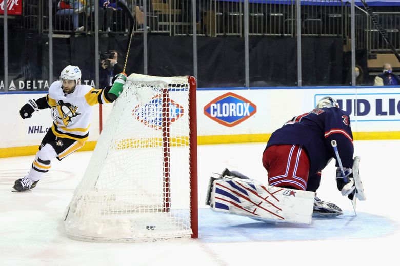 Jason Zucker's late goal leads Pittsburgh Penguins over Nashville Predators