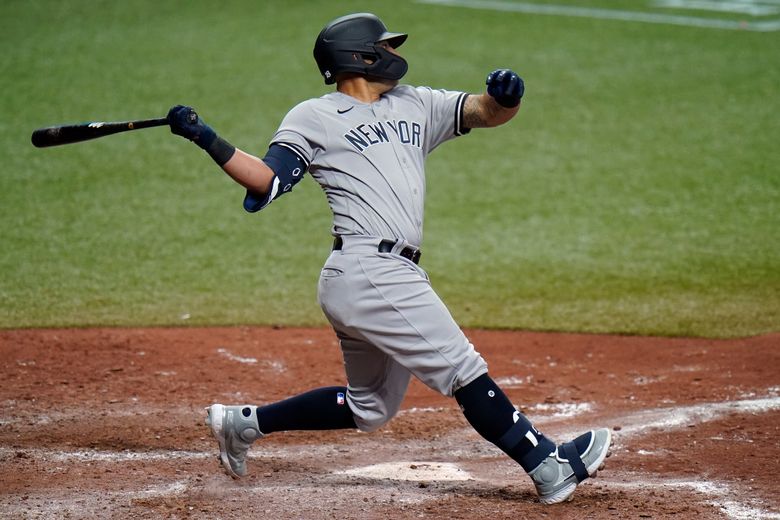 Odor snaps late tie with 1st hit as Yankee, NY tops Rays 8-4