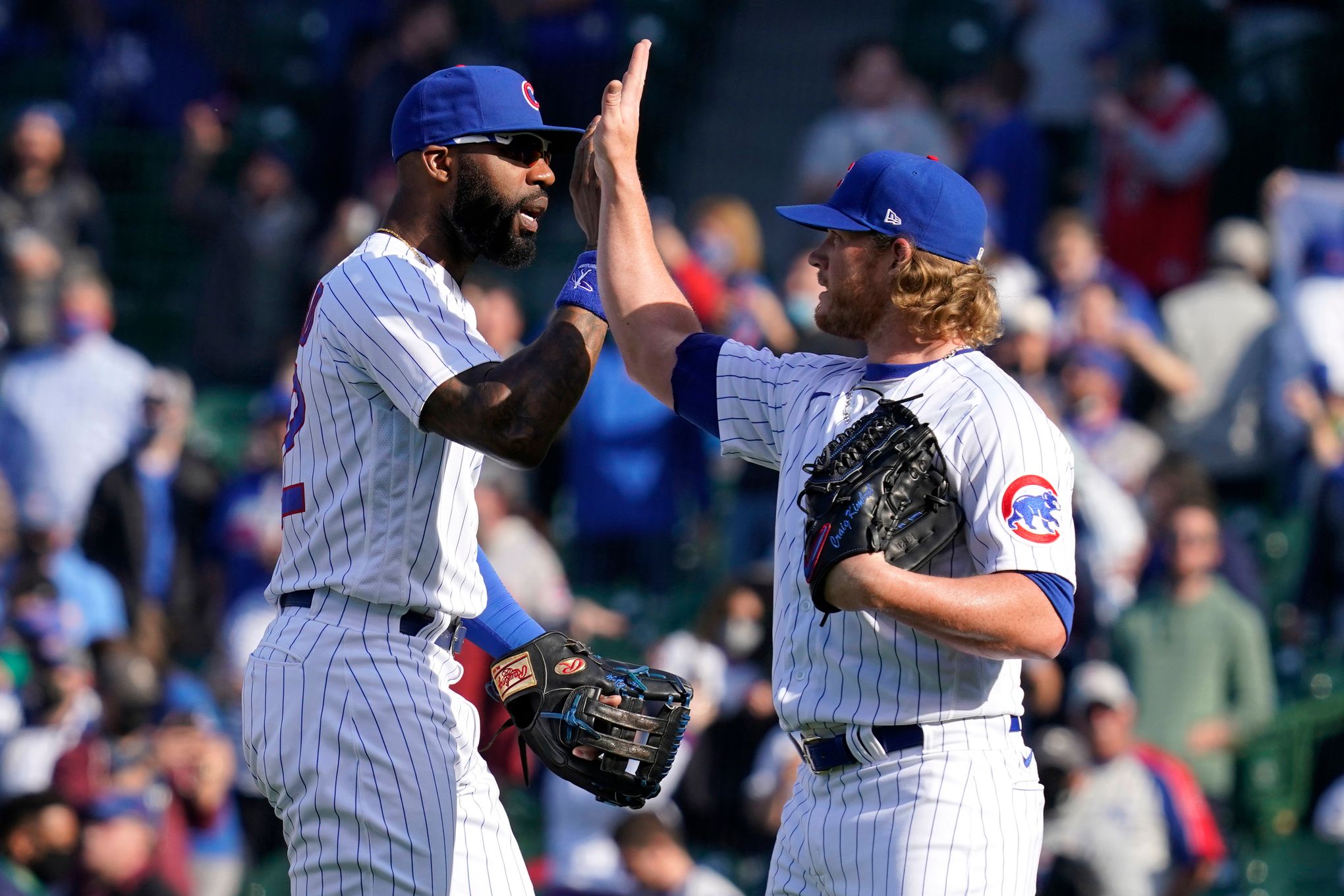 Cubs break out of slump, slip by reeling Pirates 4-2