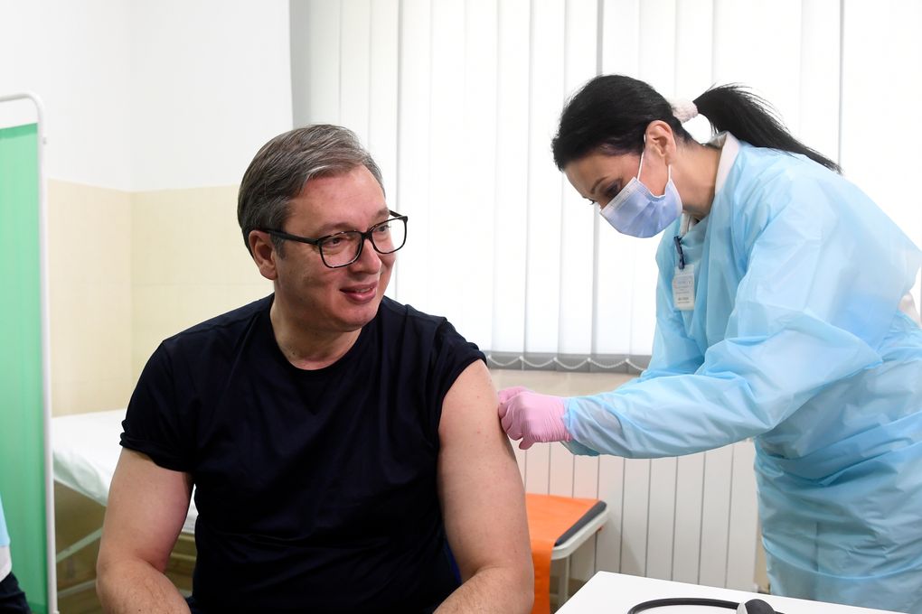 In this photo provided by the Serbian Presidential Press Service, Serbian President Aleksandar Vucic receives a dose of the Chinese Sinopharm vaccine in the village of Rudna Glava, Serbia, Tuesday, April 6, 2021. Vucic finally rolled up his sleeve for a coronavirus vaccine Tuesday and to encourage his country’s increasingly skeptical Serbs to get vaccinated themselves. (Serbian Presidential Press Service via AP)