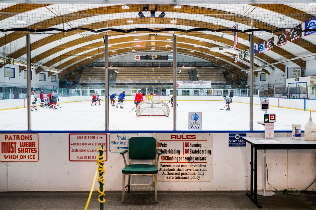The Manchester Flames, a youth hockey team, practice at the JFK Memorial Coliseum in Manchester, N.H., last November. Youth hockey has had more coronavirus cases than most sports nationwide. (Photo for The Washington Post by Adam Glanzman).