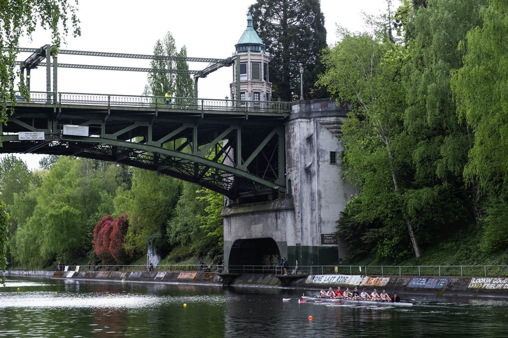 Normally the bridge across the Montlake Cut would be filled with fans, and closed to traffic. But the University of Washington streamed racing, and discouraged crowds from attending. The bridge was open to car traffic. California and Washington were the marquis matchup in this year’s Windermere Cup, contested on the Montlake Cut Saturday, May 1, 2021. 217001 (Dean Rutz / The Seattle Times)