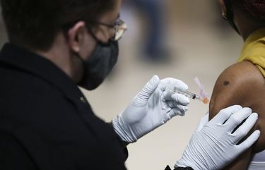 A person is administered a dose of the Johnson & Johnson COVID-19 vaccine at a city mass vaccination clinic at the Salvation Army at 55th and Market in West Philadelphia on Friday, March 26, 2021. (Heather Khalifa/The Philadelphia Inquirer/TNS) 14911026W 14911026W