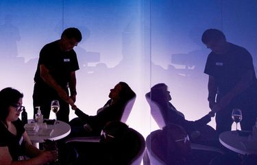 Attendees receive hand massages inside the moonrise tranquility room of the American Express Co. Centurion Lounge during a media preview event at Los Angeles International Airport (LAX) in Los Angeles, California, U.S., on Thursday, March 5, 2020. AmEx has told shareholders that spending on membership services, which includes its lounge collection, will be its fastest-growing expense this yearâ€”cost decisions that came prior to the current crimp on global travel due to coronavirus. Photographer: Patrick T. Fallon/Bloomberg 775492866