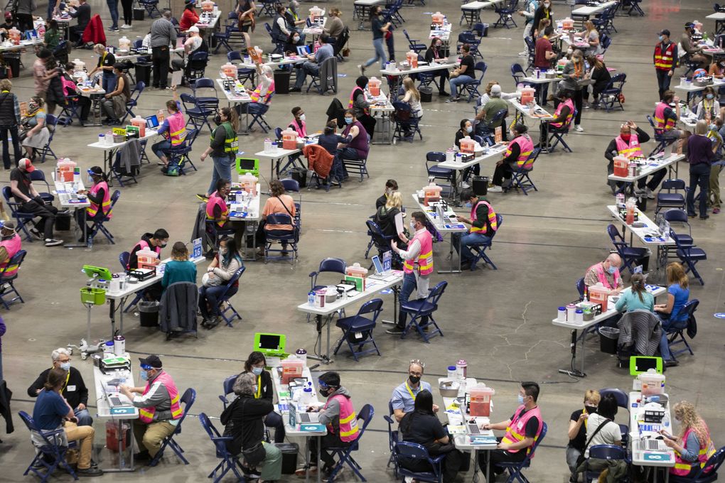 COVID-19 vaccinations underway in April at the Lumen Field Event Center in Seattle. (Ellen M. Banner / The Seattle Times)