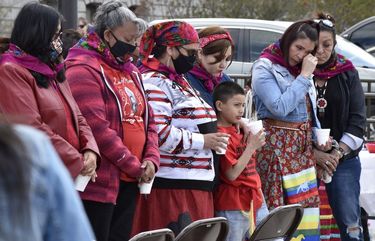Family members of missing and murdered indigenous women in Montana gather in front of the state Capitol in Helena, Mont., Wednesday, May 5, 2021. They received colorful shawls in a traditional Native American ceremony called “wiping away of tears.” From Washington to Indigenous communities across the American Southwest, top government officials, family members and advocates gathered Wednesday as part of a call to action to address the ongoing problem of violence against Indigenous women and children. (AP Photo/Iris Samuels) RPIS301 RPIS301
