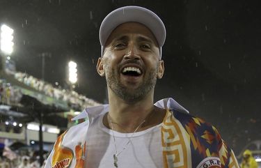 In this Feb. 15, 2015 photo, comedian and actor Paulo Gustavo participates in the Carnival parade at the Sambadrome in Rio de Janeiro, Brazil. The popular comedian died in a Rio hospital from complications related to COVID-19. He was 42. (AP Photo/Bruna Prado)