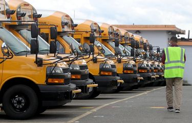 Seattle school district buses parked in the First Student bus lot at 13525 Lake City Way. The school district isn’t able to provide bus transportation for many of the kids who have gone back to in person school because of a shortage of drivers. 217087