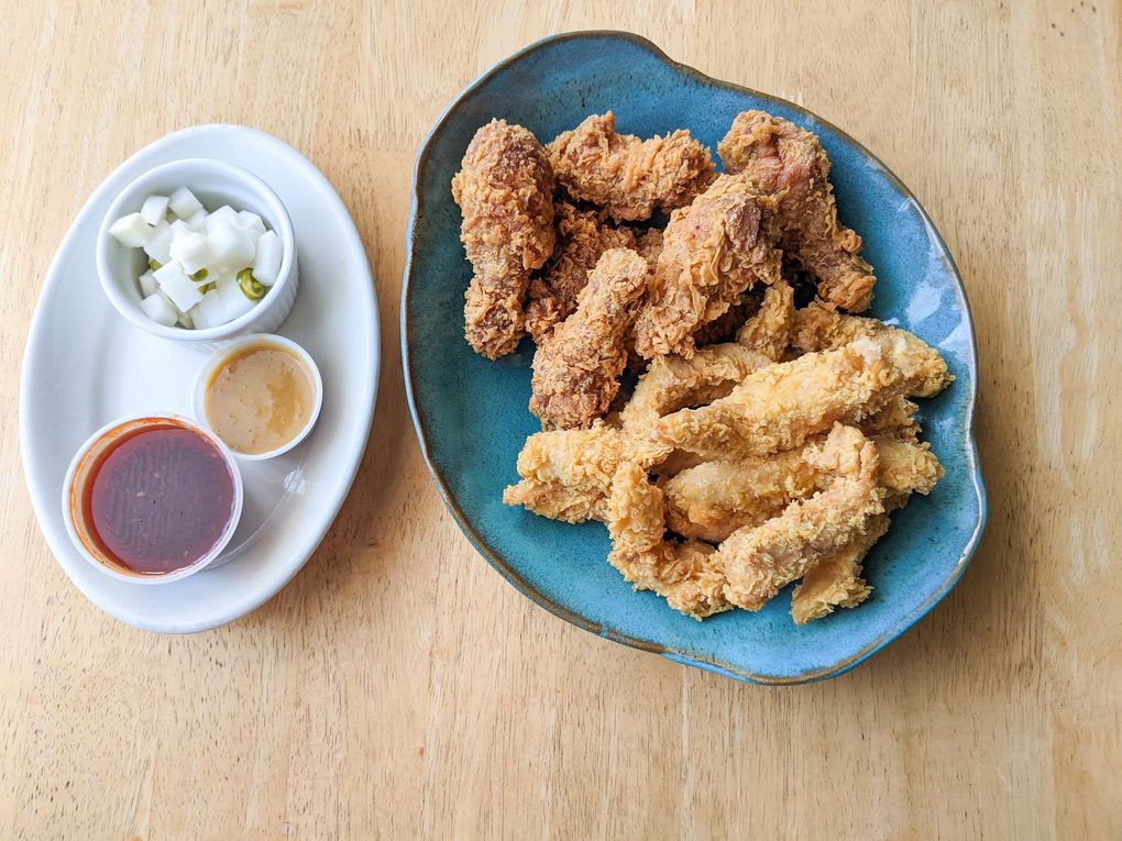 The ban ban chicken and chicken breast tenders from Yummy Teriyaki & Fried Chicken in Edmonds are both incredibly crisp and served with a side of spicy pickled daikon. (Jackie Varriano / The Seattle Times)