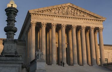 In this Nov. 6, 2020 photo, The Supreme Court is seen as sundown in Washington. (AP Photo/J. Scott Applewhite) WX201 WX201