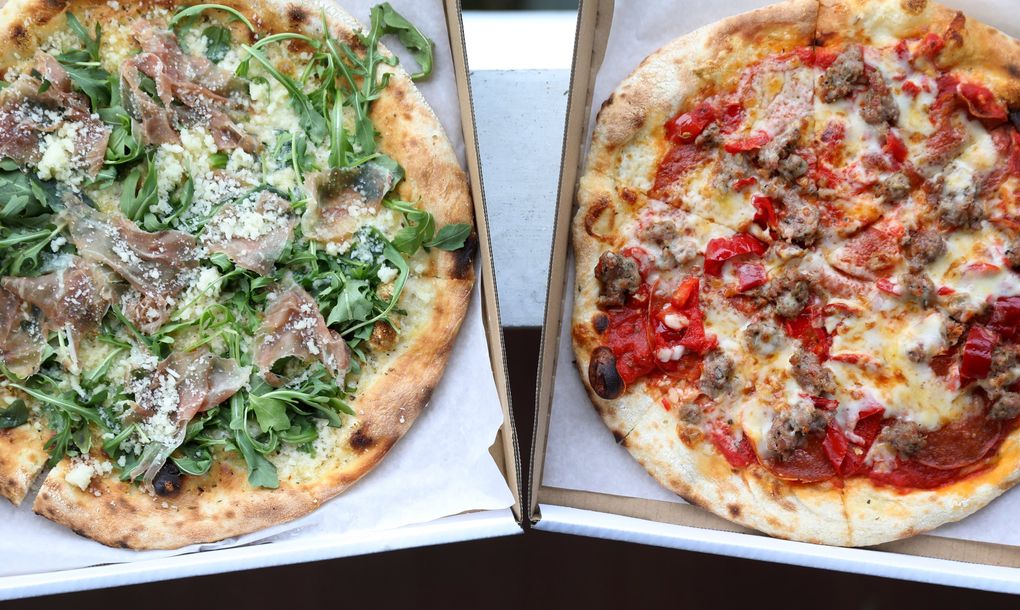 Little Lago Grocer in Portage Bay changed hands, but the pizza menu — which includes the prosciutto arugula, left, and the salsiccia pepperoni — remains. (Ken Lambert / The Seattle Times)