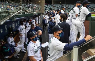 The Mariners get ready to take the field Thursday against San Francisco.  The San Francisco Giants played the Seattle Mariners in the season opener for both teams Thursday, April 1, 2021 at T-Mobile Park in Seattle, WA. 216782