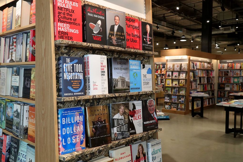 The layout inside the new Barnes & Noble bookstore in Kirkland doesn’t feature straight-line rows of shelves, but room-like nooks for each genre. (Greg Gilbert / The Seattle Times)