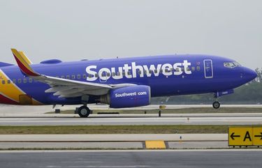 FILE – In this April 20, 2021 file photo, a Southwest Airlines Boeing 737 passenger plane takes off from Fort Lauderdale-Hollywood International Airport in Fort Lauderdale, Fla. Southwest Airlines is pushing back plans to resume selling alcohol on flights after a recent increase in unruly passengers. The airline planned to start selling booze on some flights next month. But on Friday, May 28, the airline said it was delaying the move. (AP Photo/Wilfredo Lee) NYBZ507 NYBZ507