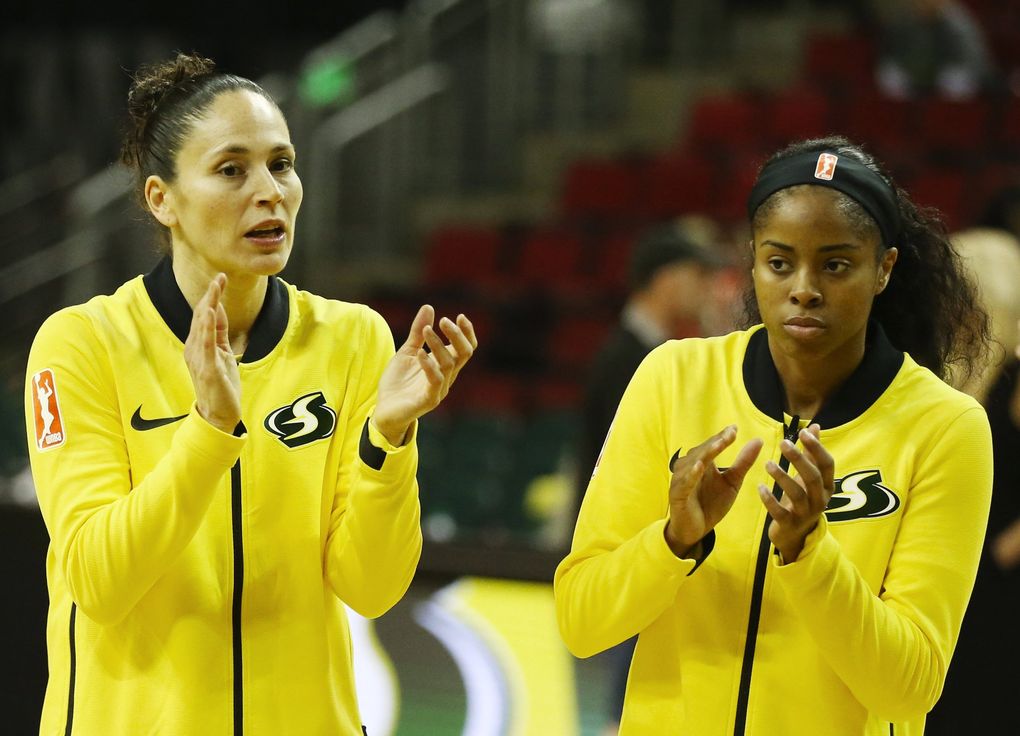 Storm guards Sue Bird, left, and Jordin Canada, right, during the first exhibition game of the season, against Phoenix, Tuesday, May 8, 2018 at KeyArena in Seattle. (Ken Lambert / The Seattle Times)