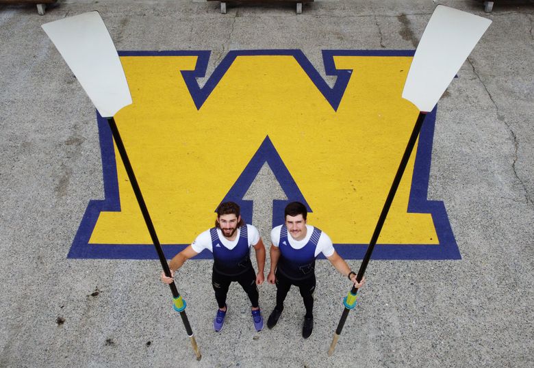University of Washington men’s rowers Austin Regier, left, and Sam Halbert, Thursday, May 20, 2021 in Seattle. The two are in the midst of training for the IRA National Championship Regatta. (Ken Lambert / The Seattle Times)